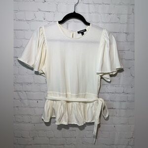 Express size small cream colored peplum pullover
